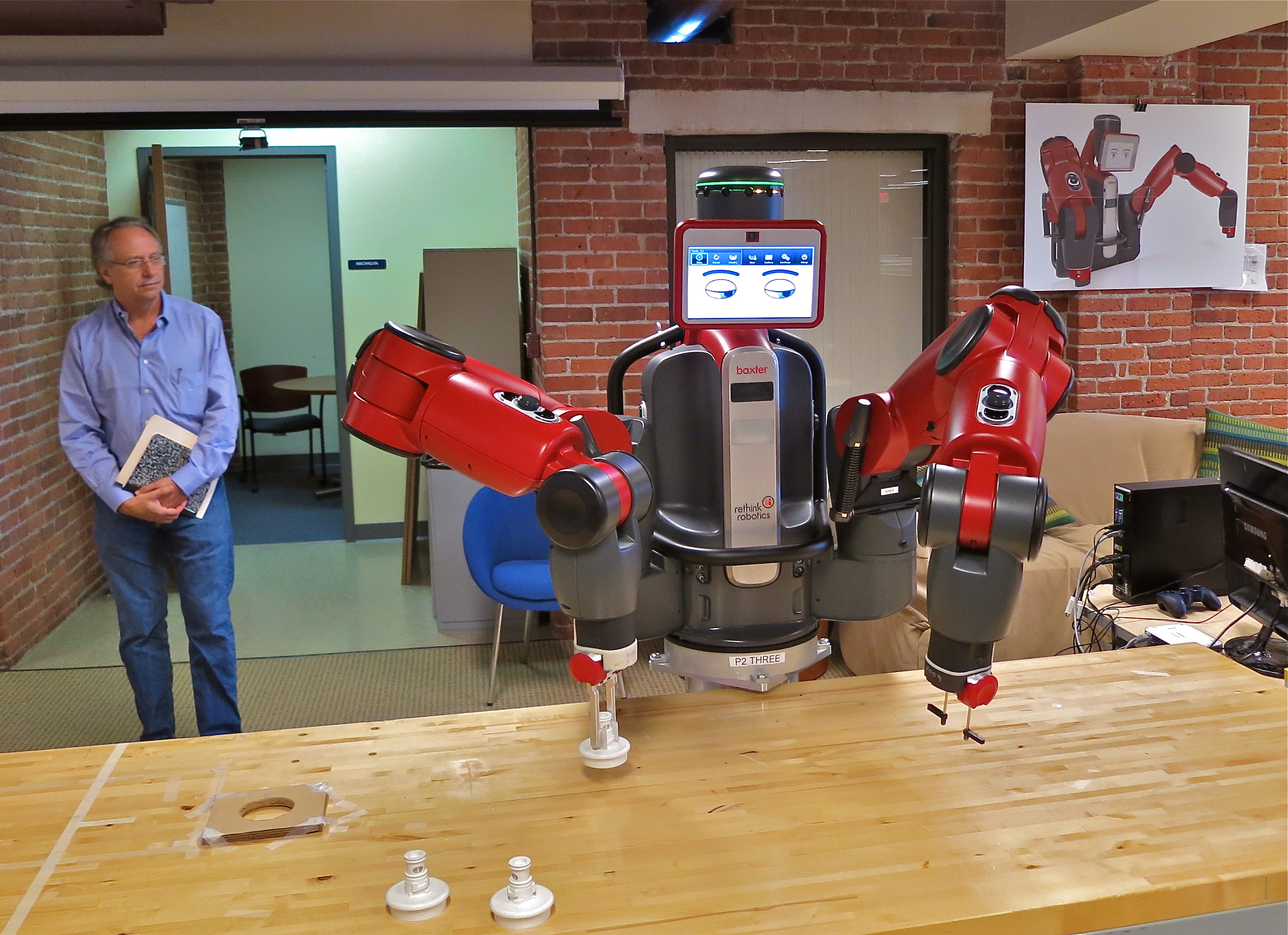 Industrial robotic arm in a factory setting